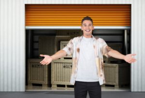 Man standing in Front of Storage Unit